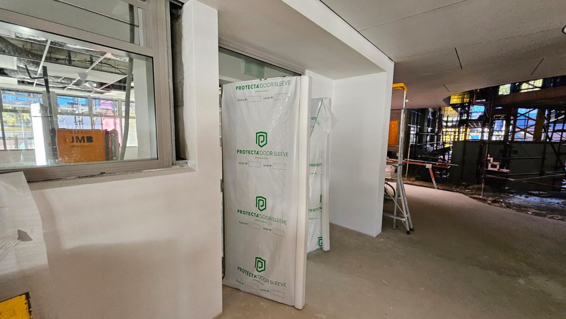 Introducing the Protecta Door Sleeve: A Game-Changer in Door Protection for Construction Projects